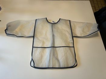 Tablier / Blouse imperméable  TRÈS BON ÉTAT mixte taille 4 ans couleur transparente