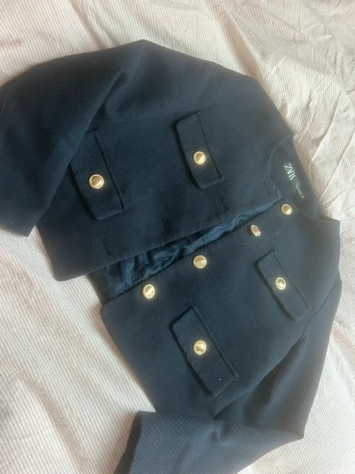 veste bleu marine et doré