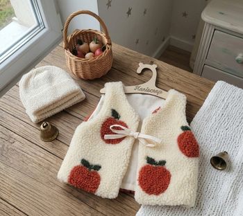 Gilet sans manche motif pomme