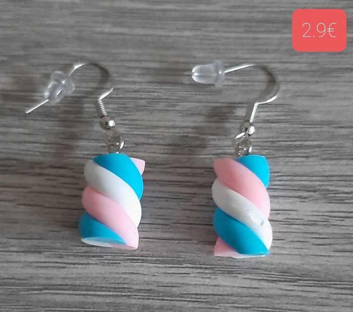 a vendre boucles d'oreilles.neuves emballees