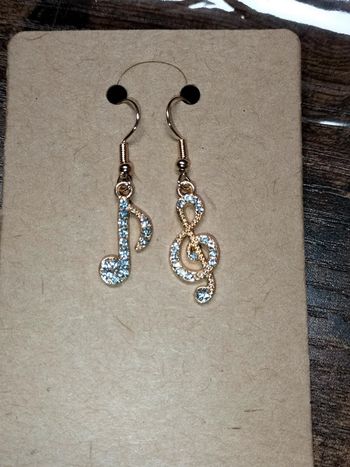 Boucle d'oreille note de musique doré