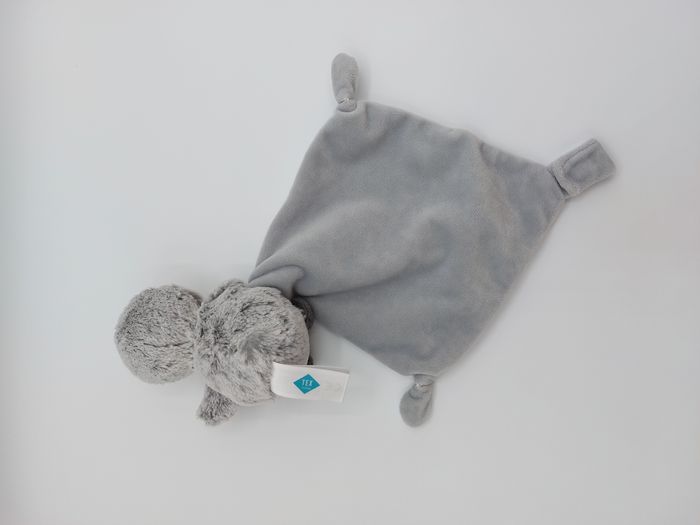Doudou peluche pingouin gris blanc TEX BABY mouchoir mon doudou étoiles TTBE - photo numéro 2