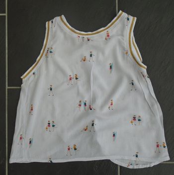 Joli haut dos nu fille 6 ans (114-119 cm)