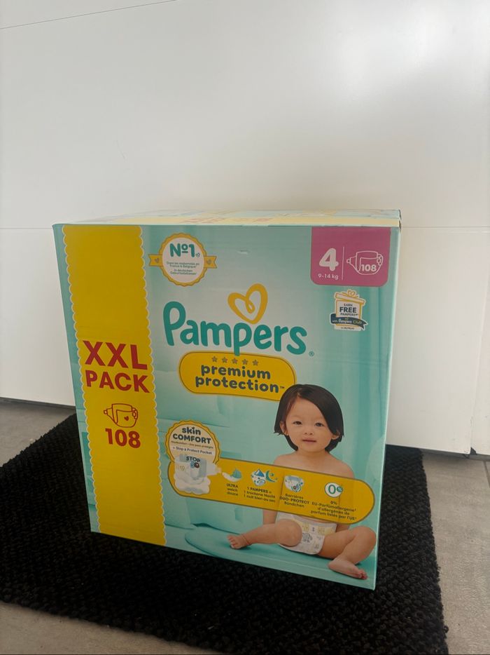 Couches Pampers prenium protection