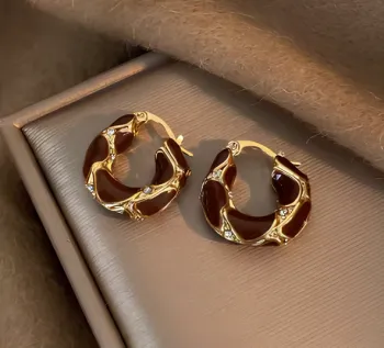 Boucles d’oreilles créole tâche de vin et doré