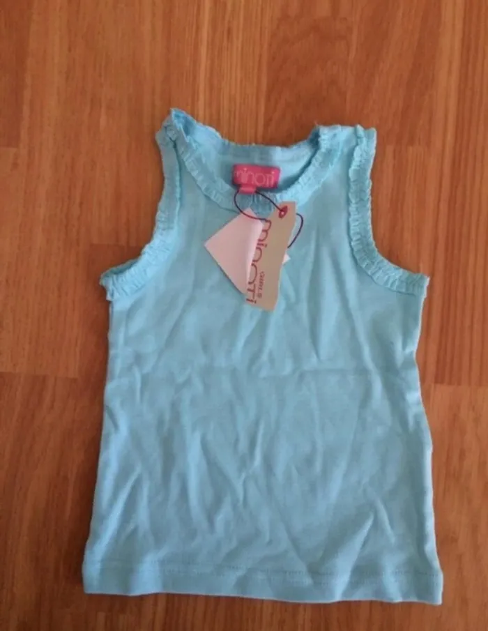 Debardeur neuf avec étiquettes 12 mois