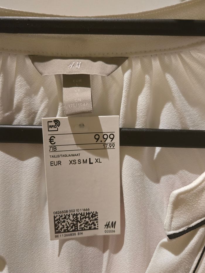 Blouse sans manches blanches T.L 42/44 H&M neuve - photo numéro 3