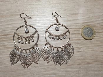 Ravissantes créoles vintage strass feuilles