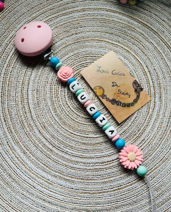 Attache tétine fleur