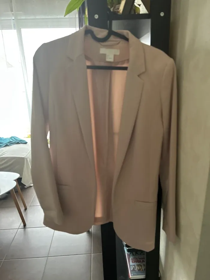 Veste rose poudré