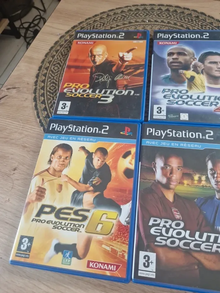 Lot de 4 jeux PlayStation 2 tres bon etat pro évolution soccer - photo numéro 2