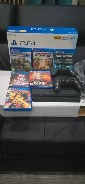 Ps4 500go avec 3 manettes et 6 jeux