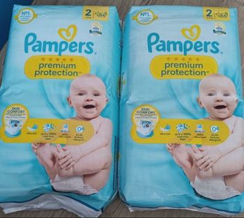 5 paquets de couches Pampers prenium taille 2