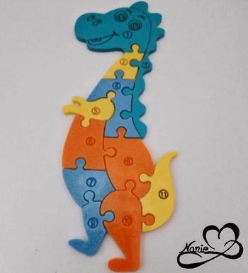 Le puzzle Dino en résine orange et bleu 🦕