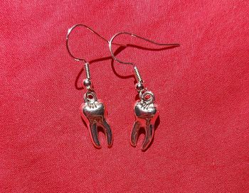 Boucles d'oreilles dents