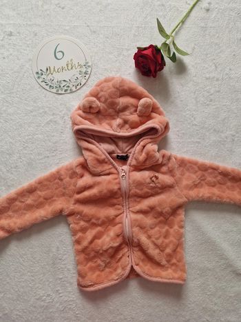 Veste polaire orange avec capuche