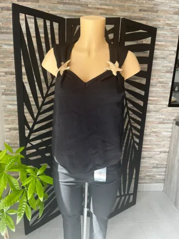 Pull sans manche avec étoiles de mer