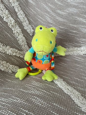 Peluche doudou musical 18cm babysun grenouille vert et orange très bon état