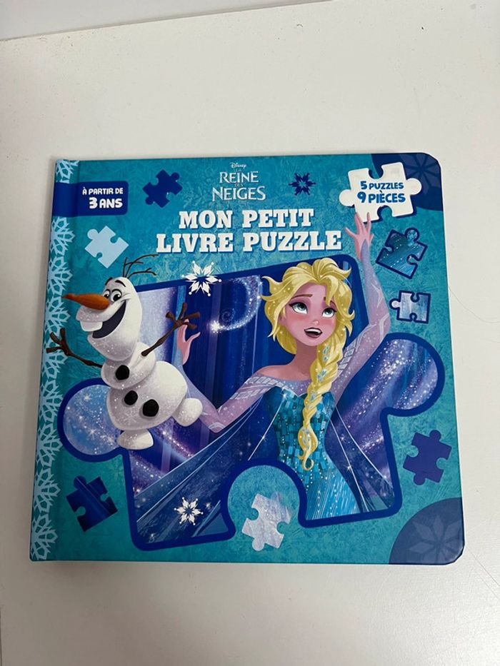 Livre puzzle la reine des neiges neuf