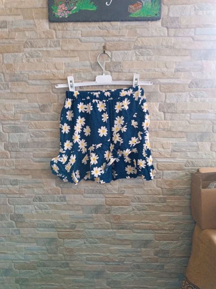 Jupe marine à fleurs 10A