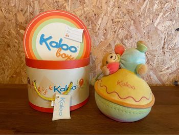 Peluche Doudou Kaloo culbuto jaune et vert Kaloo Ours bleu