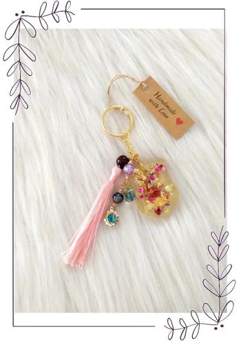 Porte-clé bijou de sac résine pompon et perles