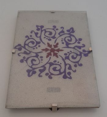 Tableau de sable fleur sous verre 10x15cm