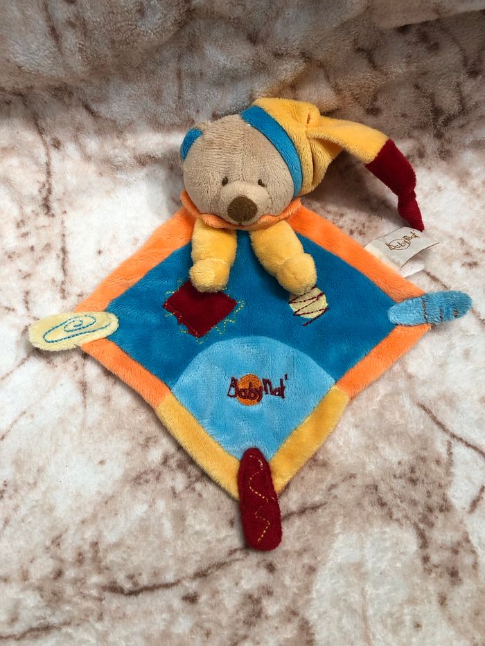 Doudou plat losange ours beige bleu orange bonnet Babynat BabyNat’