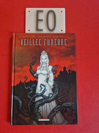 Bd veillée funebre, EO