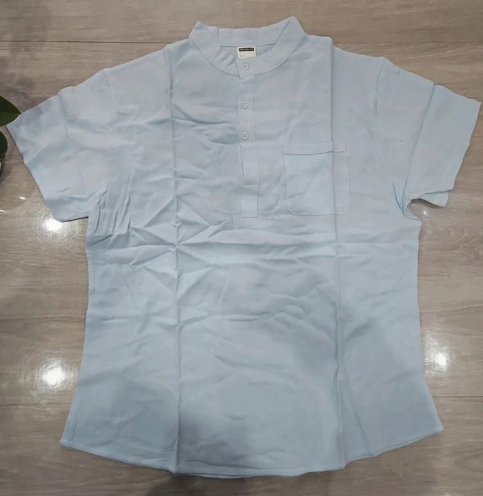 Neuve jolie chemise homme bleue clair T L