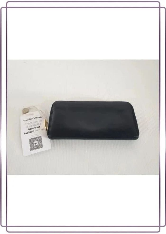 Portefeuille Saint Laurent vintage en cuir, bon état mais quelques  traces d'usures, 20x10cm