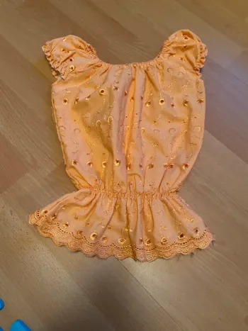 Blouse orange Taille M enfant