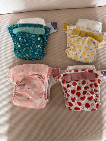 Lot de 4 couches bambino mio + booster