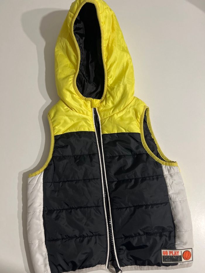 Manteau dans manche 4ans