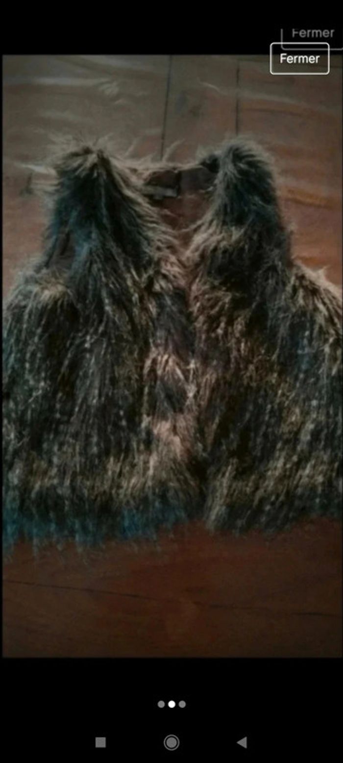 Gilet sans manches 8 ans - photo numéro 2