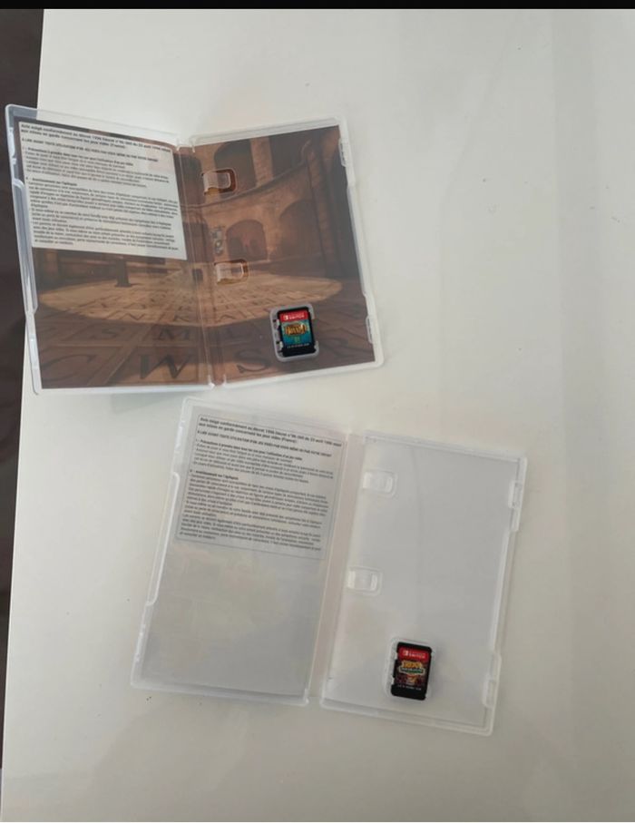 Nintendo switch + 2 jeux de vidéos de switch - photo numéro 8