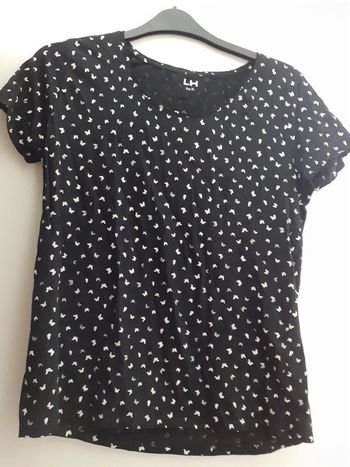 T-shirt femme noire avec papillons blanc et argenté taille XL