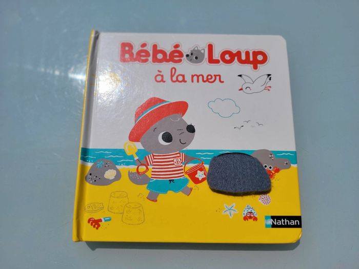 Bébé Loup à la mer 🏖 livre à caches feutrine - photo numéro 2