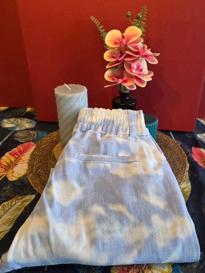 Jeans bleu ciel nuages S