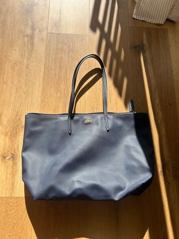 Sac Lacoste bleu marine en super état