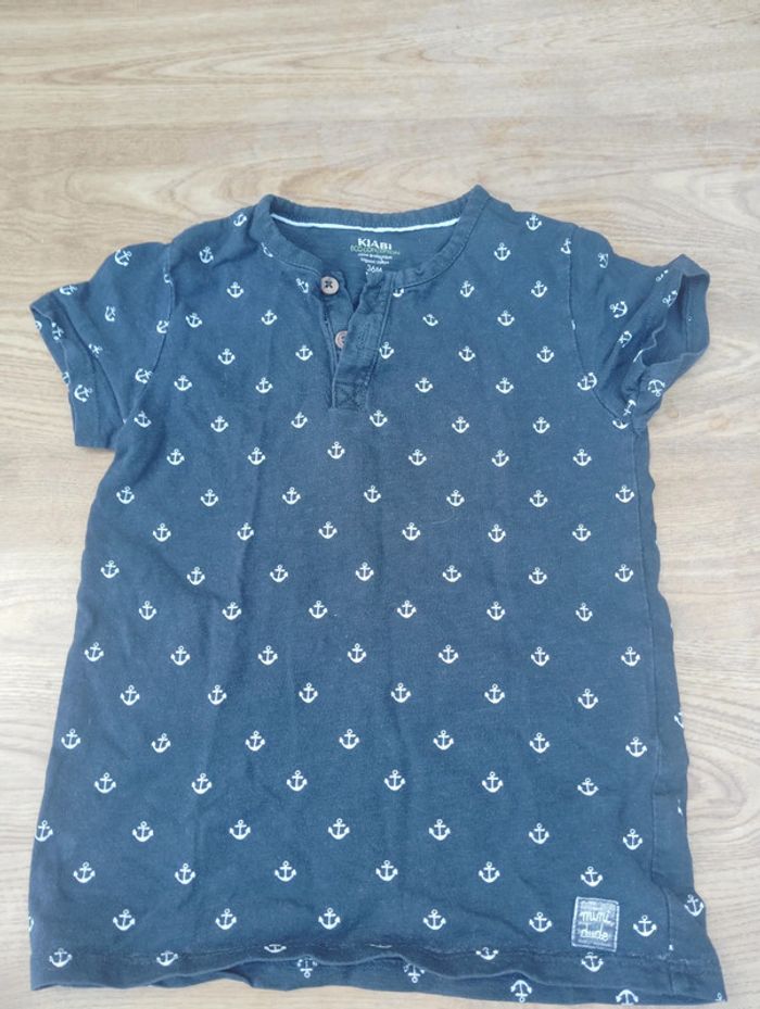 T-shirt enfant bleu marine Kiabi – encres blanches