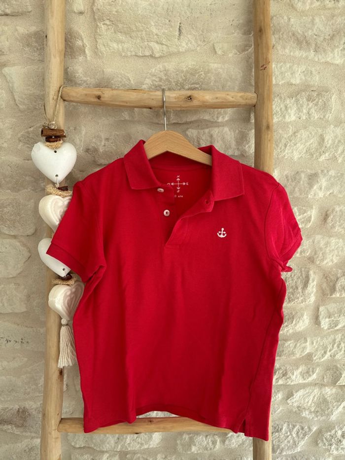 Polo rouge 10 ans - 4 €