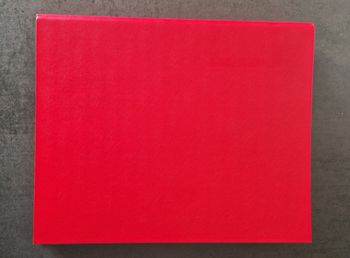 Classeur A4 rouge comme NEUF + 50 pochettes transparentes Exc. état à NEUVES