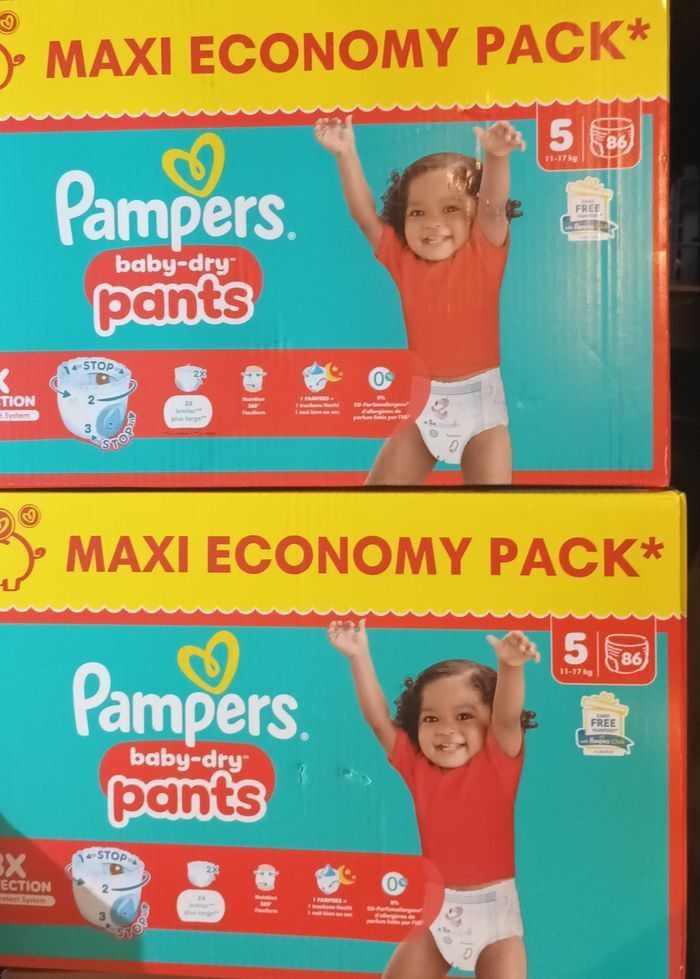 Deux cartons couches pampers T5 pants