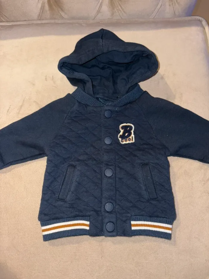 Blouson avec capuche amovible