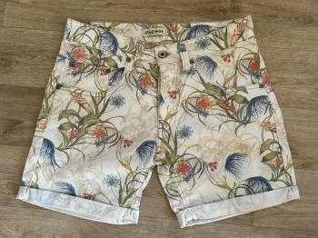 Please short imprime fleuri taille 38