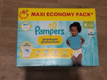 Couches Pampers  taille 6