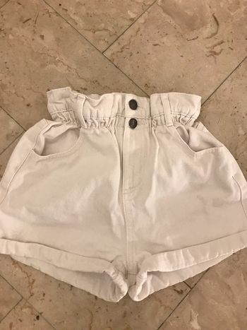 Short court en jeans crème taille 32