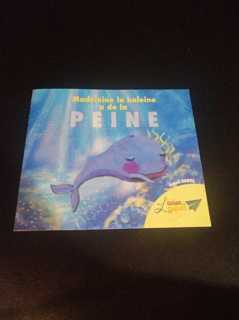 Livre souple madeleine à de la peine