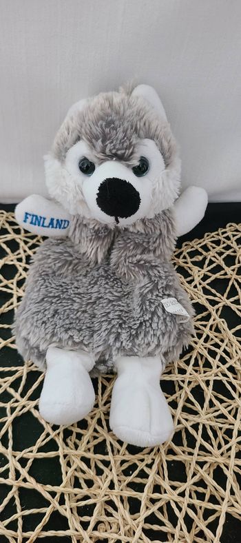 Peluche Husky avec pochette de rangement